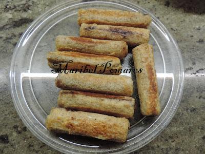 Flamenquines de pan de molde con nutella o también llamado pan francés.