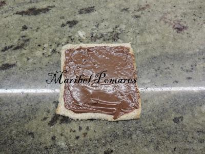 Flamenquines de pan de molde con nutella o también llamado pan francés.