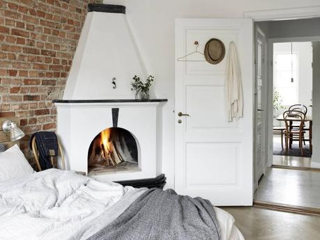 piso pequeño decoración inspiración nórdica estilo escandinavo decoración textiles decoración estilo nórdico decoración calida decoración acogedora confortable chimenea en el dormitorio blog decoracion interiores 