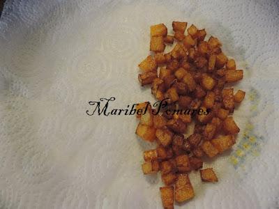 Bacalao rebozado con calabaza frita y patatas paja.