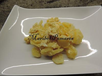 Patatas con huevos rotos.