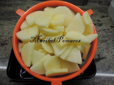 Patatas con huevos rotos.