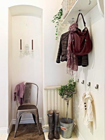 Ideas para decorar y sacar partido al recibidor con elementos auxiliares prácticos