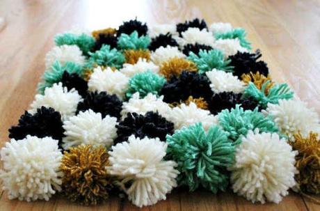 10 Perfectly Cozy DIY Projects. Pom Pom Blanket - Make it for: those mornings when you're dreading letting your feet touch the cold, cold apartment floor.: 