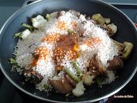 Arroz con costillejas, coliflor y judías tiernas.