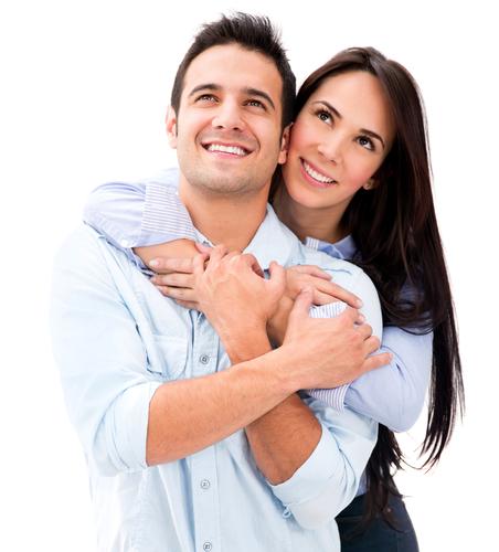 Thoughtful couple hugging and looking up - isolated over white