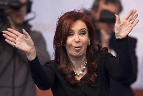 Argentina's President Cristina Fernandez waves to supporters during the inauguration of a health center in Buenos Aires, Argentina, Tuesday, Oct. 25, 2011. Fernandez was re-elected in a landslide Sunday, winning with the widest victory margin in the country's history as voters were mobilized by popular programs that spread the wealth of a booming economy. (AP Photo/Victor R. Caivano)