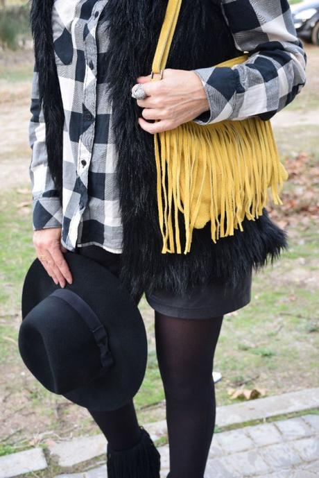 Faux fur vest and checked shirt