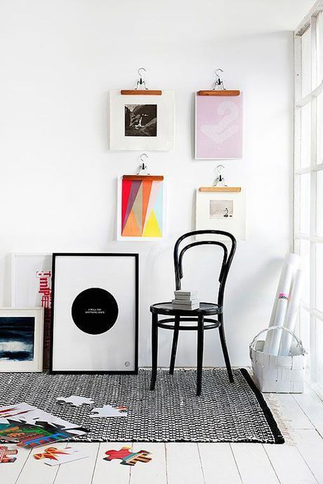 ideas for hanging posters with wooden hooks