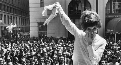 01 Aug 1969, San Francisco, California, USA --- Demonstrators remove their brassieres during an anti-bra protest outside a San Francisco department store. --- Image by © Bettmann/CORBIS