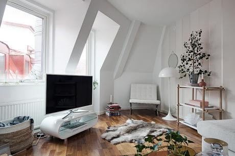 Un duplex con la cocina en la zona de paso