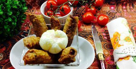 Rollitos de carne rebozada con pimiento verde