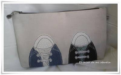 FUNDA CON BOQUILLA, NECESERES Y BOLSO DE Gail Pan.