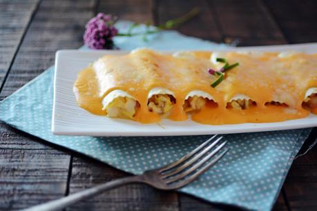 Canelones de merluza y gambas con bechamel de piquillos