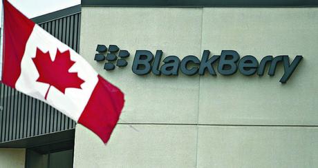 TUESDAY, JULY 9, 2013 FILE PHOTO FILE - In this Tuesday, July 9, 2013 file photo, a Canadian flag flies at BlackBerry's headquarters in Waterloo, Ontario. Struggling smartphone maker BlackBerry will consider selling itself. The Canadian company said Monday, Aug. 12, 2013, its board has formed a special committee to explore 