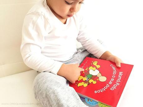 Bebé leyendo libro Mama pato cuenta a sus patitos- Nonabox Octubre