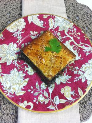 Empanada De Chipirones En Su Tinta