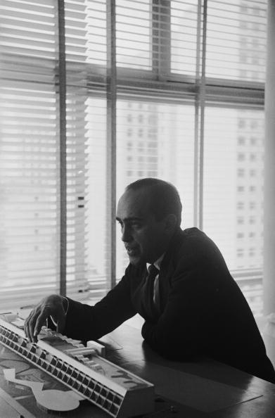 Brazilian architect Oscar Niemeyer discusses one of his designs, 3rd June 1960. Original Publication : Picture Post - 4971 - Niemeyer: A South American Revolutionary - pub. 1950 (Photo by Kurt Hutton/Picture Post/Hulton Archive/Getty Images)