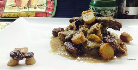 Hígado en salsa con setas salteadas