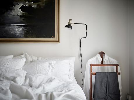 cocina nordica blanca negra chimenea sueca tradicional baldosas marroquies hidraulicas estilo sobrio elegante decoración decoración blanco y negro blog interiores nórdicos decoración salón decoración pisos pequeños cocina moderna estilo nórdico 