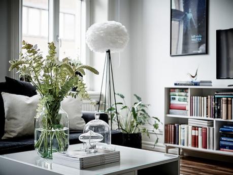 cocina nordica blanca negra chimenea sueca tradicional baldosas marroquies hidraulicas estilo sobrio elegante decoración decoración blanco y negro blog interiores nórdicos decoración salón decoración pisos pequeños cocina moderna estilo nórdico 