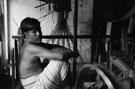 Weaver in his shop by Sudipta Arka Das