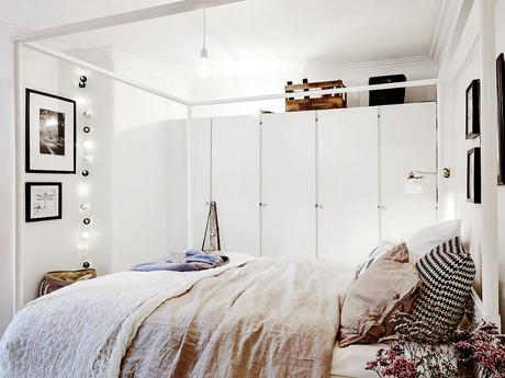 Apartamento estilo contemporáneo con los colores blanco y negro como base.