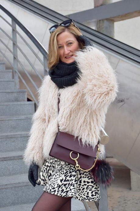 Pom pom keychain in bag winter outfits by diseneitorforever