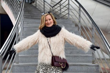 Pom pom keychain in bag winter outfits by diseneitorforever