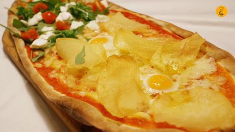 Pizza mozzarella de búfala y pizza de huevos de codorniz con patatas (13.40€) en Trattoria Manzoni Madrid Chamberí mejores pizzas