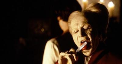 Film still from Bram Stoker's Dracula (1992) / Columbia Pictures dracula bram stoker gary oldman prince vlad jonathan harker keanu reeves shaving knife razor shave tongue lick
