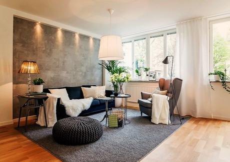 Un salón calido. La importancia de los textiles y la madera grey wall living room