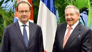 Hollande y Raúl Castro