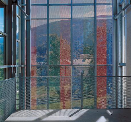 Who´s Afraid of Blue, Red and Green?, public intervention 1996/98 perforated aluminium sheets installed in front of a glass facade, lacquer coating in three colors on both sides, 959 x 411 cm,views from outside and inside, permanent installation HBLA Raumberg/Irdning (A) Photo: G. Selichar, Wien