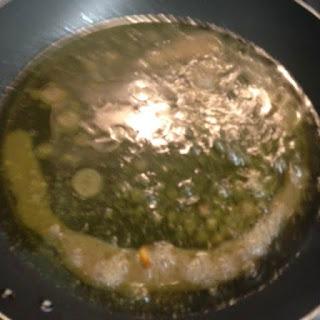 RODABALLO AL HORNO CON PATATAS Y CEBOLLA