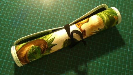 Pizarra dinosaurios enrollable