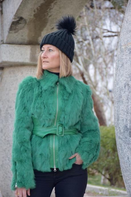 Flared jeans and green coat