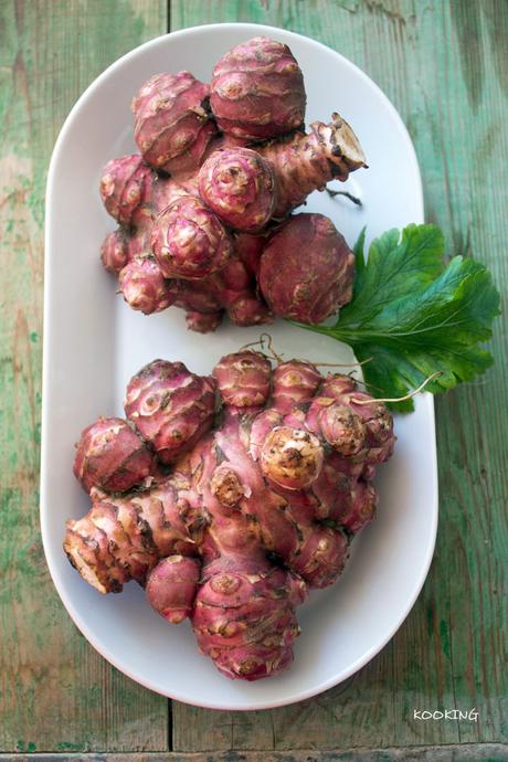 Salteado de tupinambo y portobello con persillada