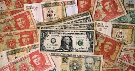 Obama podría levantar la prohibición al uso del dólar por Cuba
