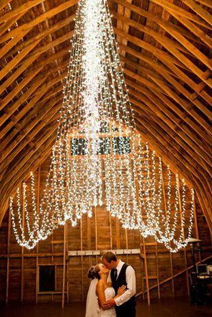 Elegant wedding string lights backdrop romance in wedding.: 
