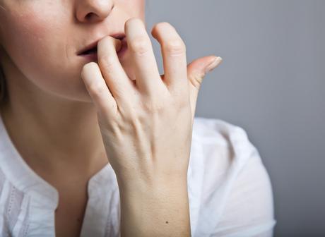 Woman in depression on gray background