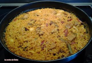Arroz en paella de sepia, ajos tiernos, ...