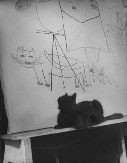 gjon-milis-cat-blackie-looking-at-his-portrait-in-mural-by-saul-steinberg-in-milis-studio