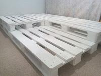 Cama hecha con palés