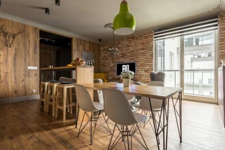 Clásico con toques citricos paredes madera nogal