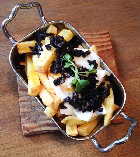 juevos rotos con butifarra negra Antunez baco y boca