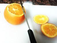 Naranja de temporada a rodajas con panela y moscatell