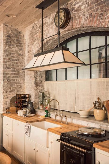 Decorar un merendero con estilo cocina con paredes de ladrillo