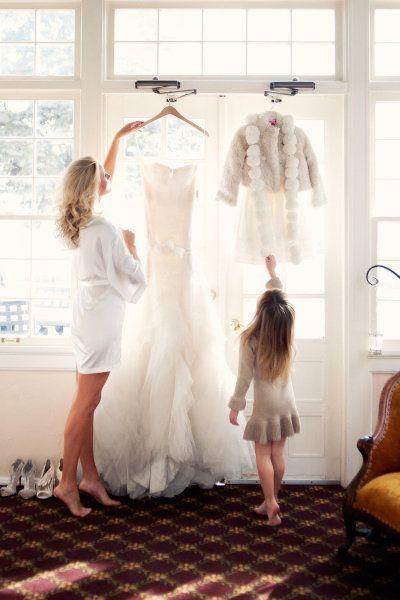 a-picture-with-the-wedding-dress-and-flower-girl-dress