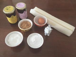 TRENZAS DE HOJALDRE CON MERMELADA DE ARÁNDANOS Y ALMENDRAS